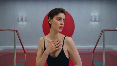 woman relaxing in a modern spa pool