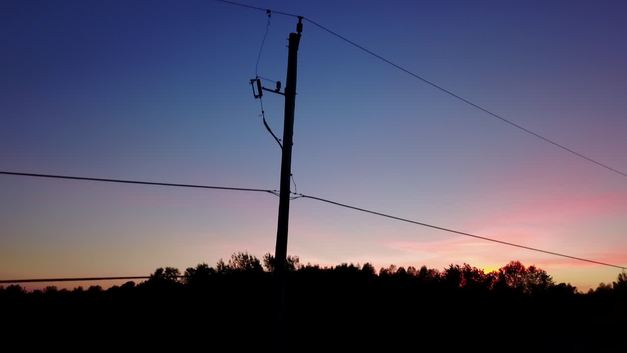 Aerial view of a beautiful and colourful sunset in the countryside