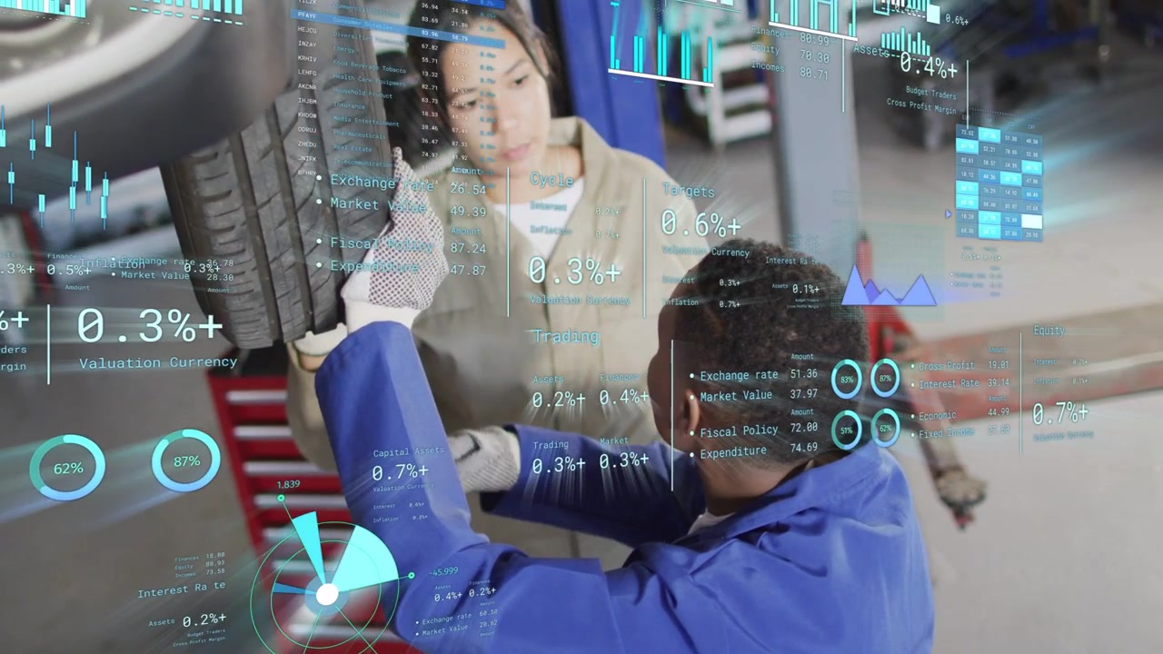 Blue tech reaching wheel area adjusting parts while peer monitoring AR diagnostics for auto repair