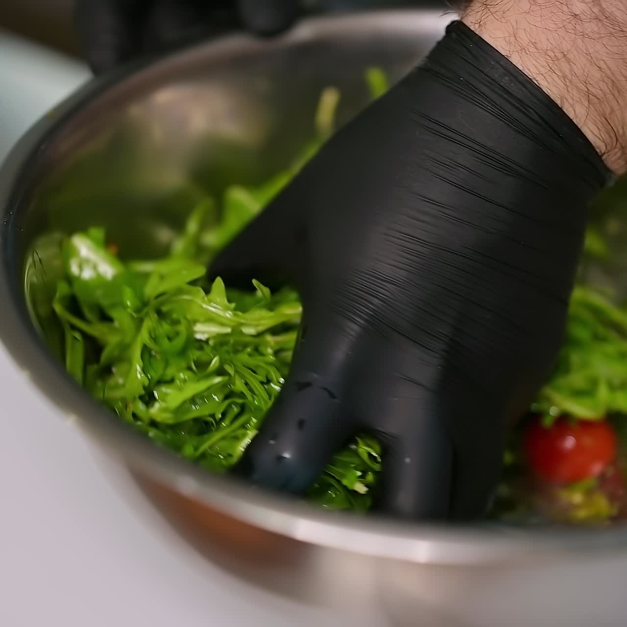 Preparing food in restaurant kitchen