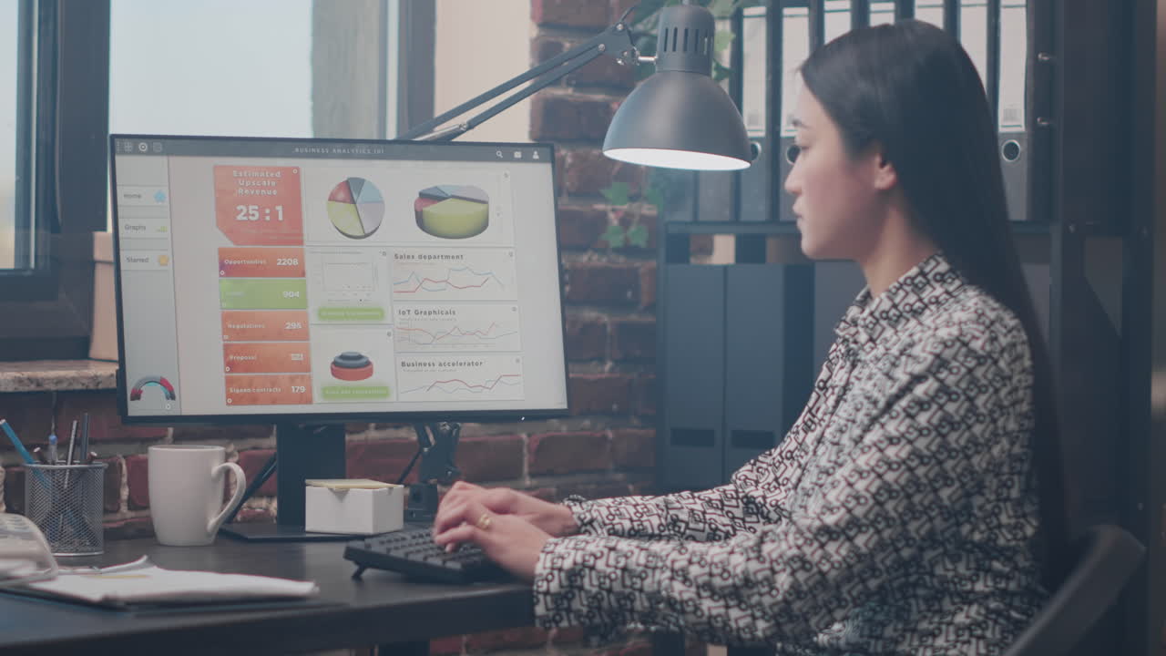 Close up of business woman using computer and keyboard
