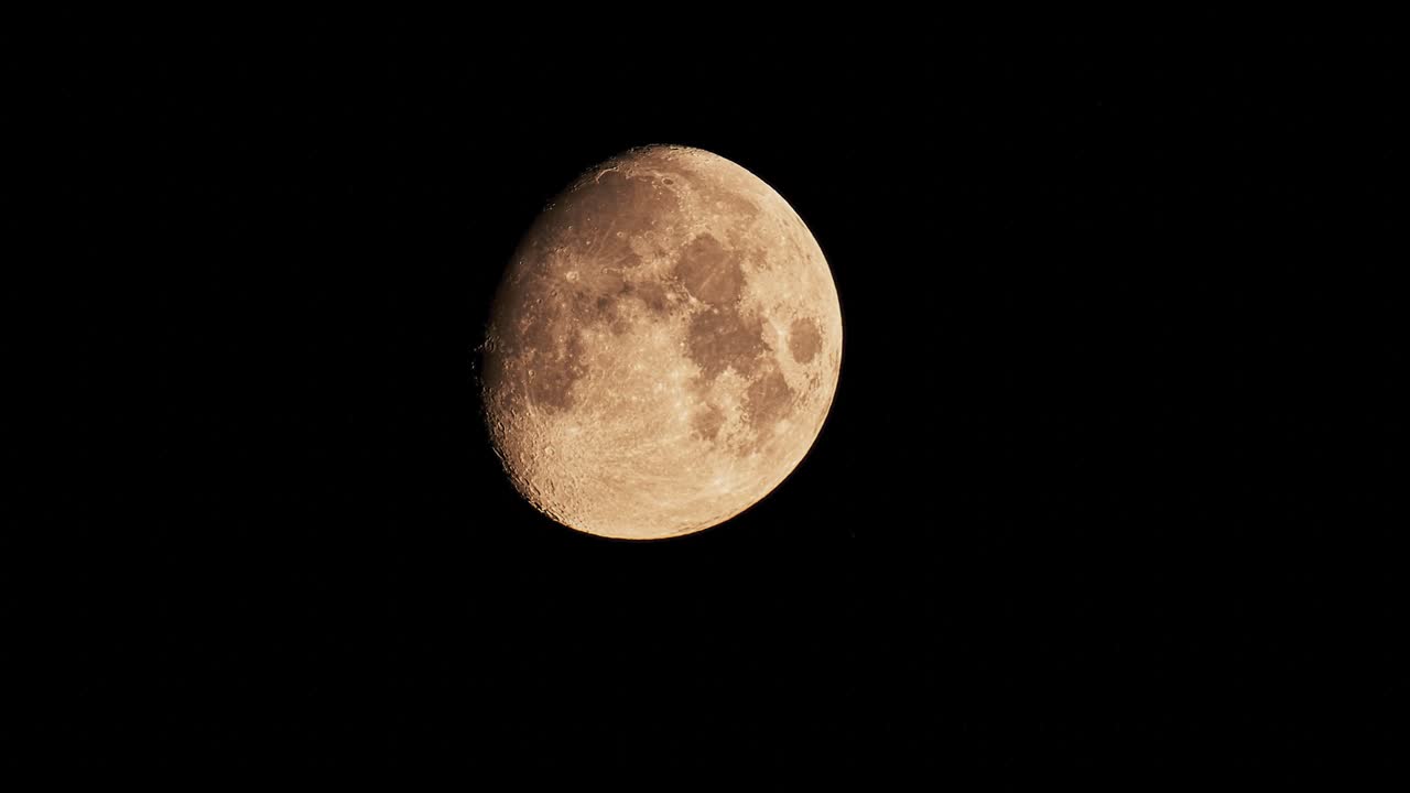 Close up Moon moving across the frame.