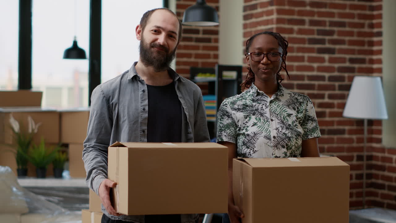Portrait of husband and wife owning rented apartment flat