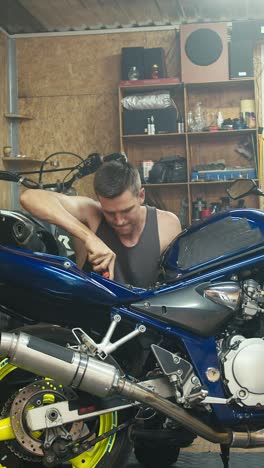 motorcycle repair in a garage