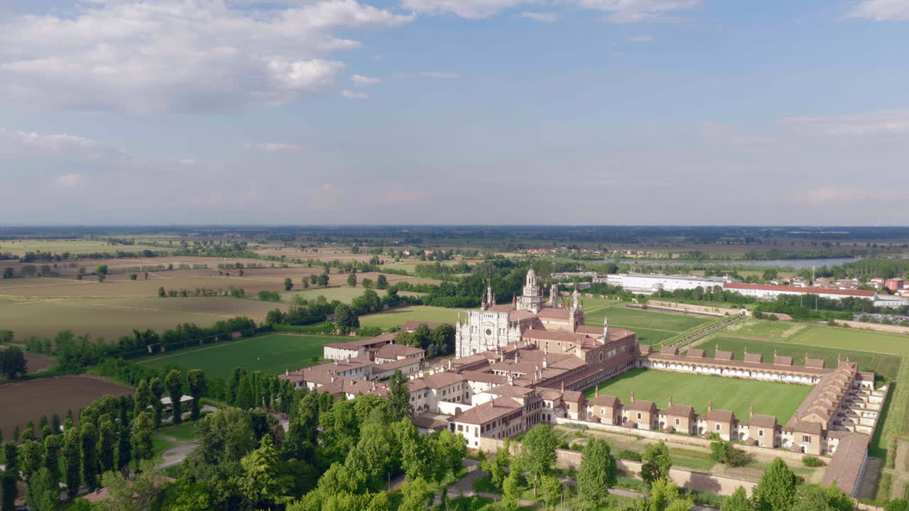 Nice aerial view of Certosa di Pavia Gra-Car (Gratiarum Carthusia, Monastery of Santa Maria delle Grazie - Sec. XIV), Pavia, Italy