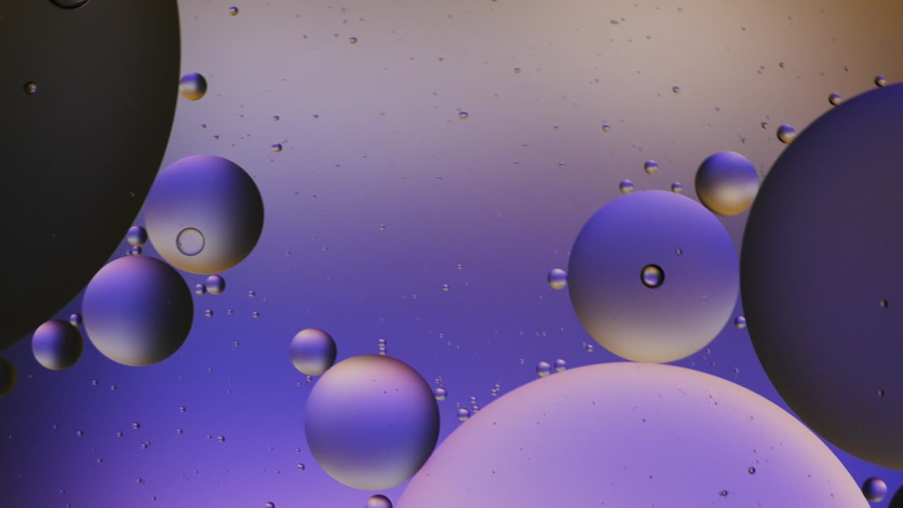 Colorful artistic of oil drop floating on the water.