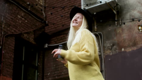 Happy-young-woman-on-the-street