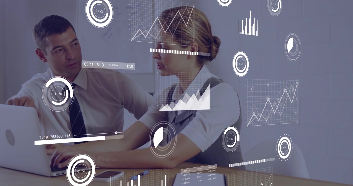 woman analyst typing on laptop as man pointing, causing analytics overlay and updating data