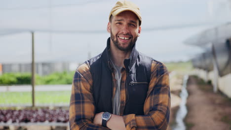 smiling farmer in a greenhouse