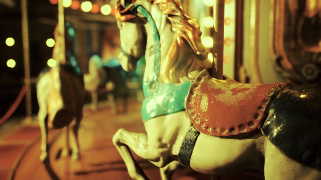 Nostalgic carousel figurine with detailed saddle and blurred background