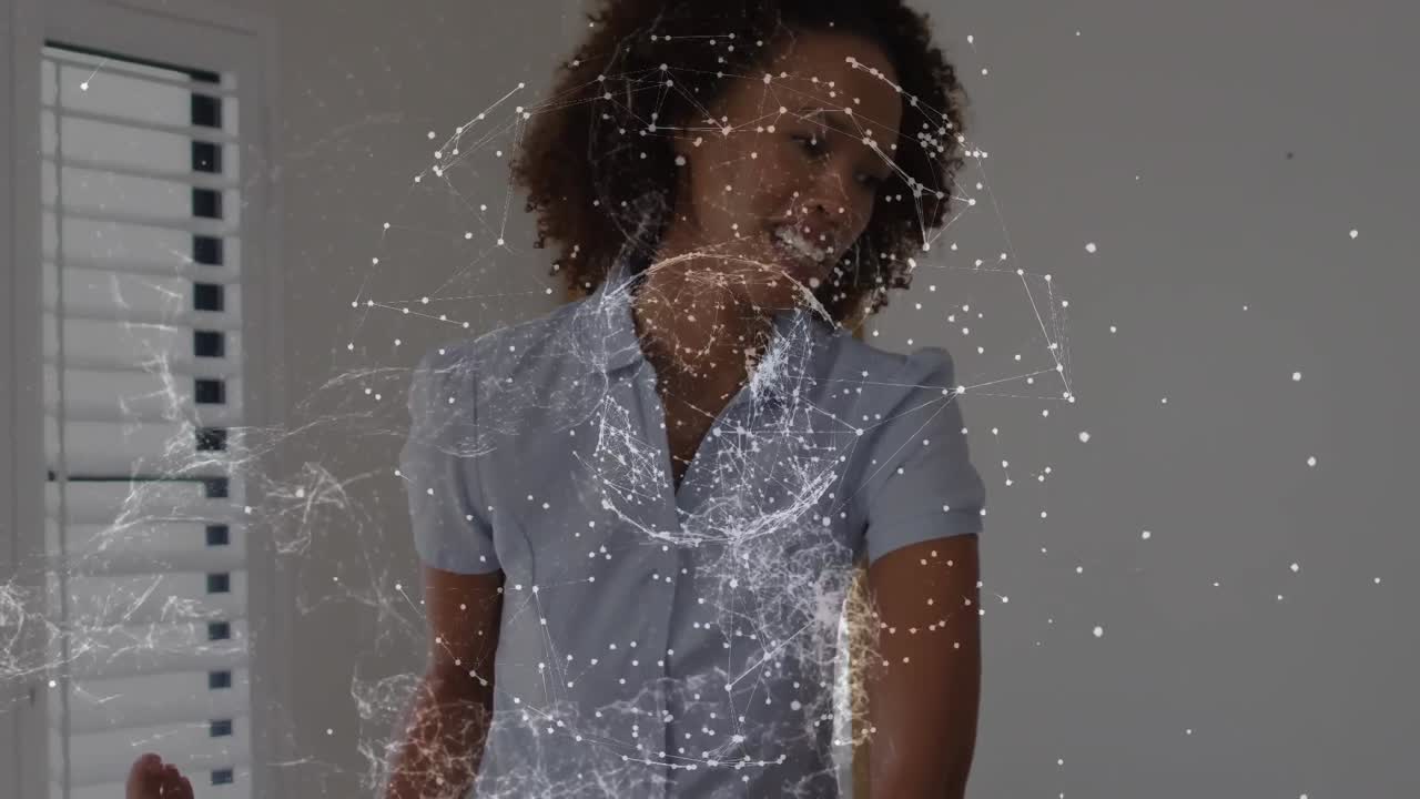 Animation of globe of connections over diverse doctor and patient exercising