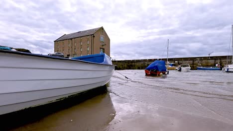 boat with propeller on sandy beach