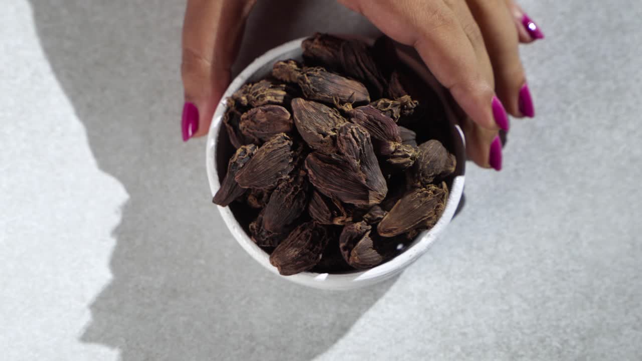 Black Cardamom - Kali Ilayachi - Badi Elaichi is placed on bowl