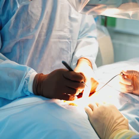 close up of surgery team operating