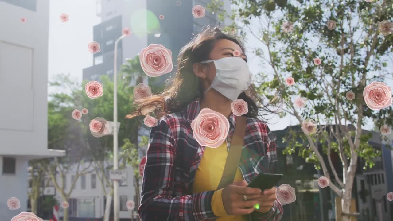 animación de flores cayendo sobre mujeres biraciales con máscara facial