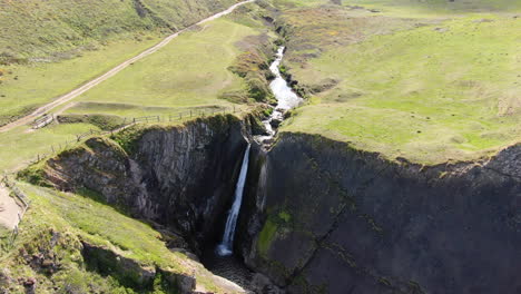 spekes mill mouth waterfall, in devon on the uk coast