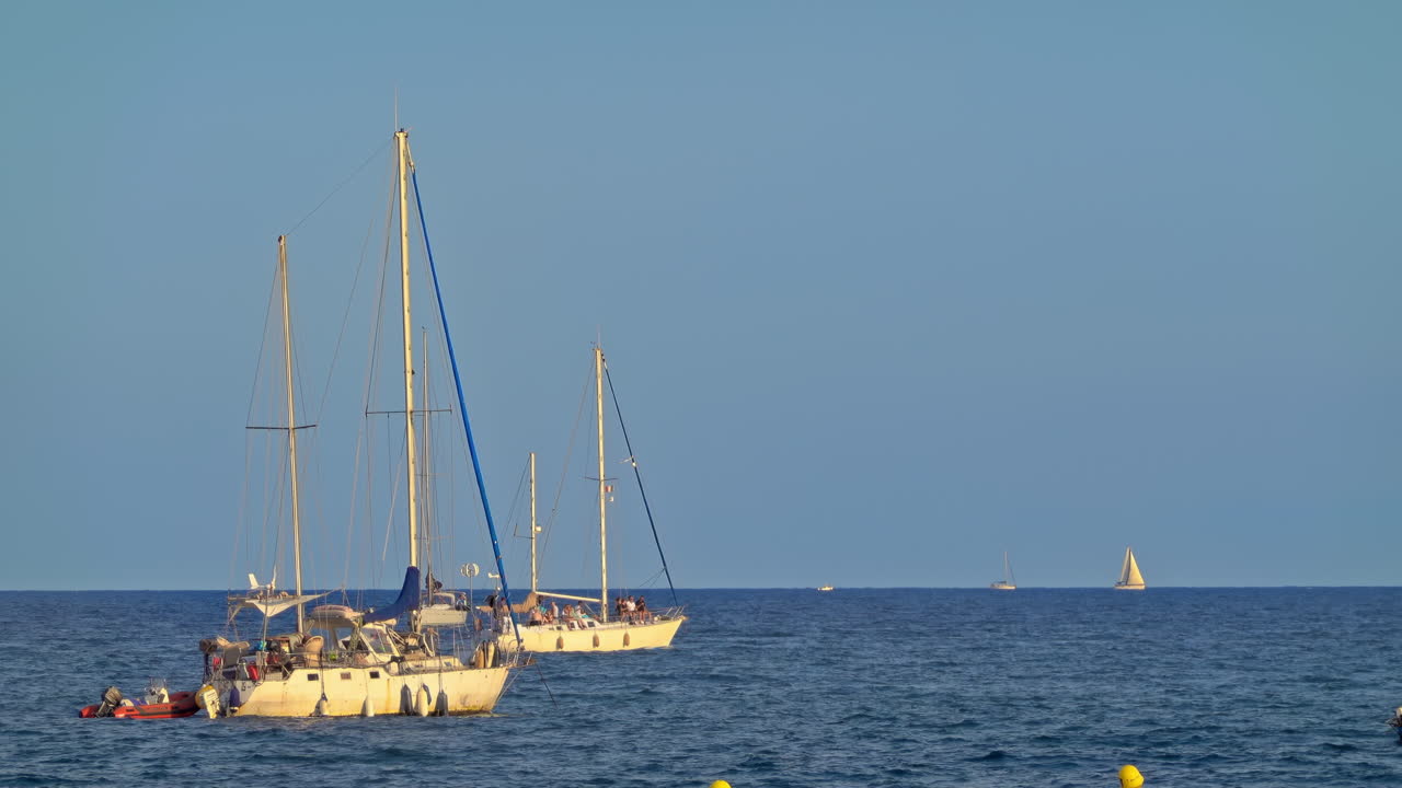 Boats moving on the sea in Golfe-Juan, France in daylight