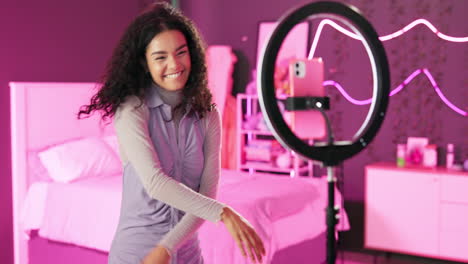 woman vlogging in bedroom