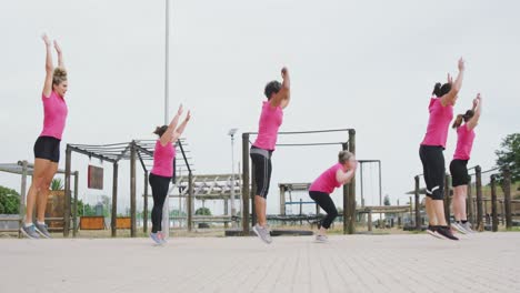 female friends enjoying exercising at boot camp together