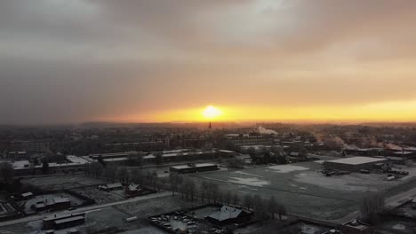 epic aerial view of sunrise at a european town in winter