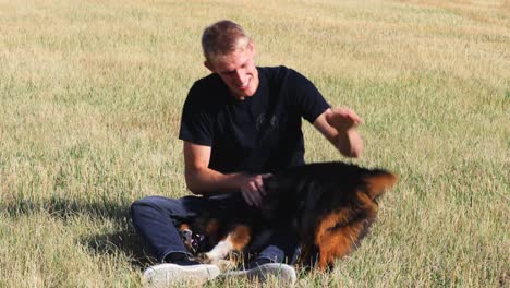 Dog-and-Owner-Playing-Together-in-a-Field