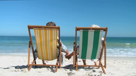 elderly man and woman looking at the horizon