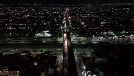 illuminated night over the streets of ecatepec, drone shot