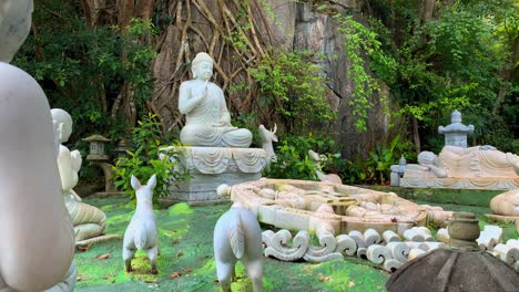 serene white buddha statues in a peaceful zen garden setting