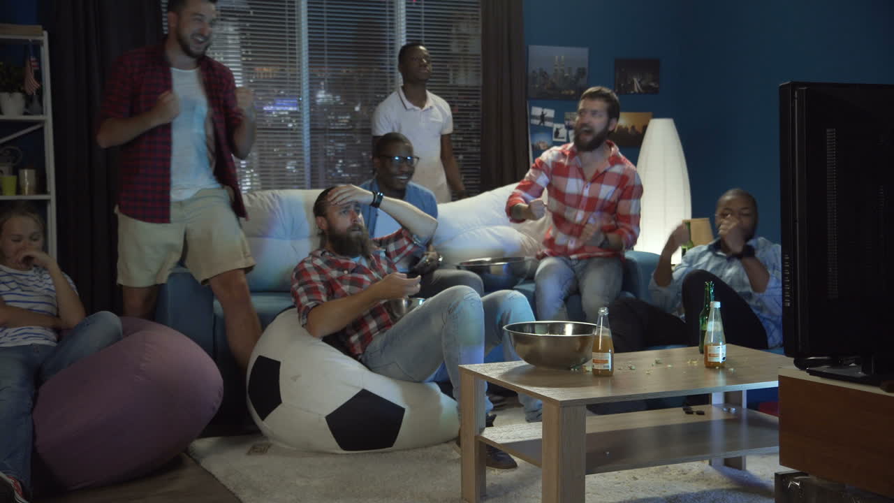 Friends Watching a Game at Home