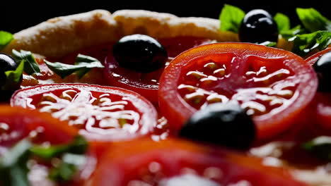 pizza with tomatoes and olives