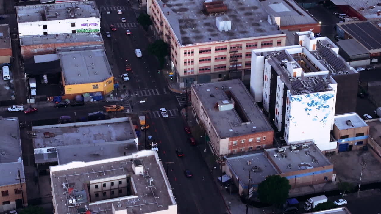 Aerial View of Urban Streets and Buildings at Dusk