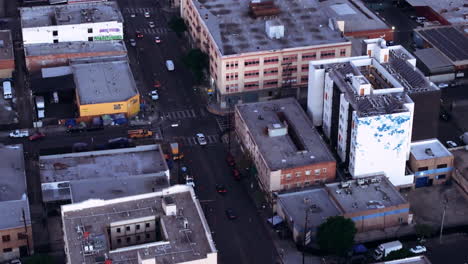 aerial view of urban streets and buildings at dusk