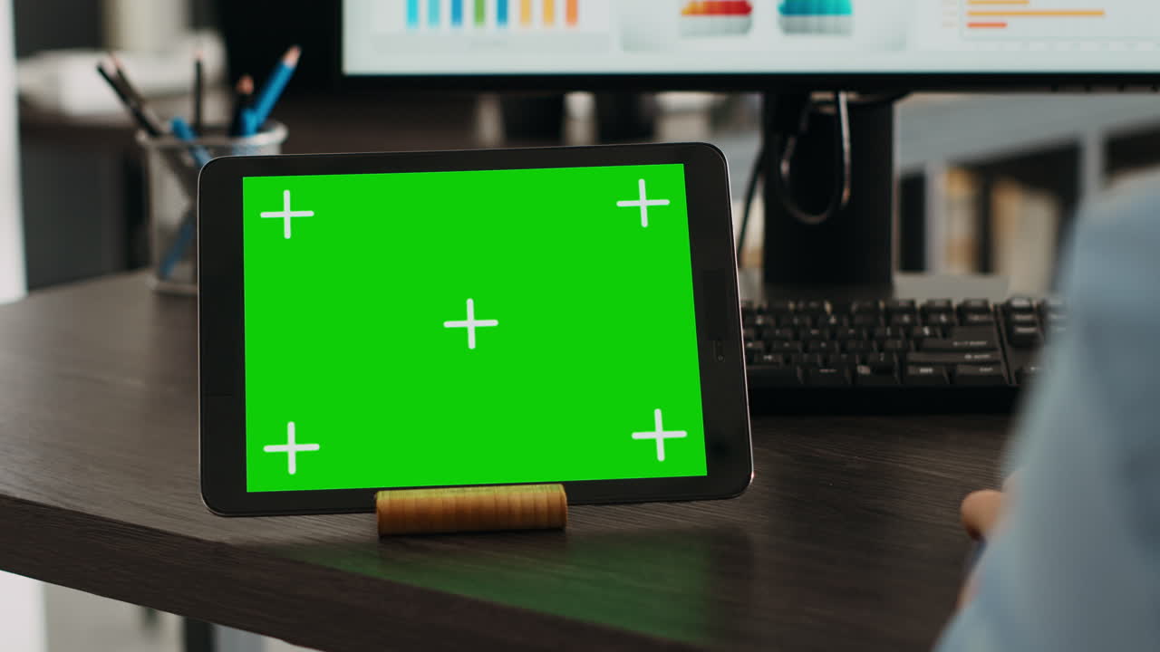 Startup specialist looks at tablet