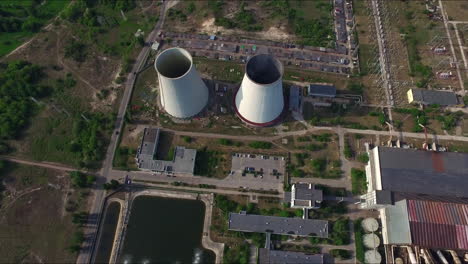 drone view smoking pipes electric power plant. chimneys on thermal power station