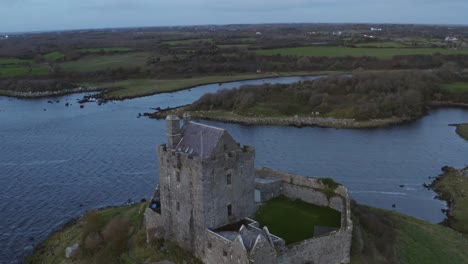 dunguaire castle. cinematic parallax aerial. county galway. ireland