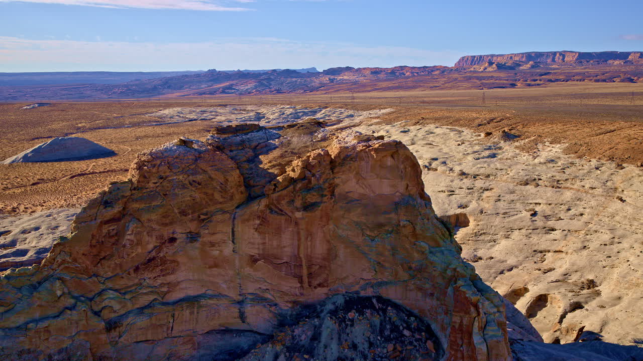 From above, the landscape of the Southwest unfolds in a dreamscape of vivid hues and natural geometry.