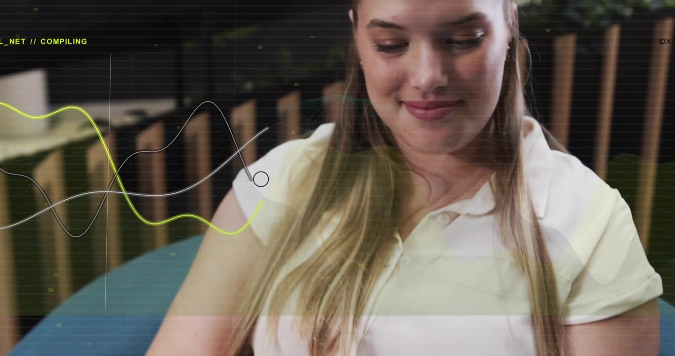 Woman tapping tablet on lap, starting COMPILING waveform for tech preview while camera pulling back