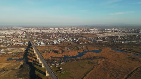 aerial view of galati viaduct near steel manufacturing plant in galati, romania.