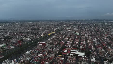 aerial view captures ecatepec on a drab, rainy day. mexico