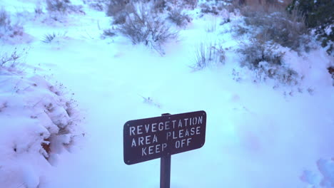 revegetation area sign in snow