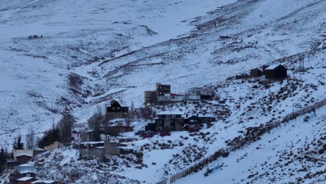 serial rotating shot showing houses built on the side of a ski slope in farellones