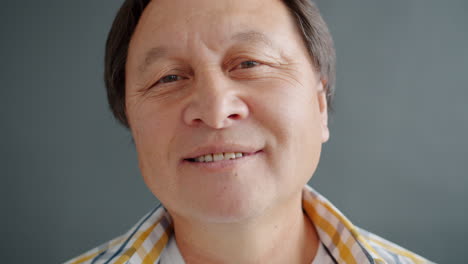 portrait of a smiling asian man