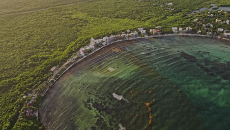 akumal mexico aerial v6 high altitude birds eye view drone flyover the bay capturing dense jungle nature, seafront resorts and luxury coastal homes - shot with mavic 3 pro cine - july 2023