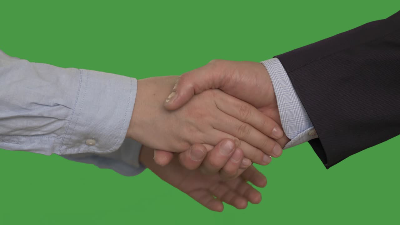 Business man and woman handshake with two hands. Alpha channel, keyed ...