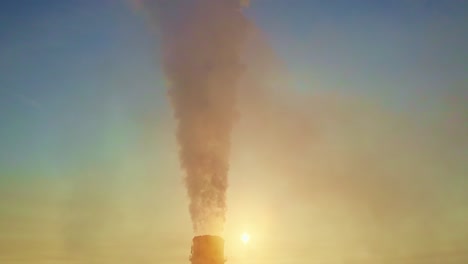smoke stack at sunrise/sunset