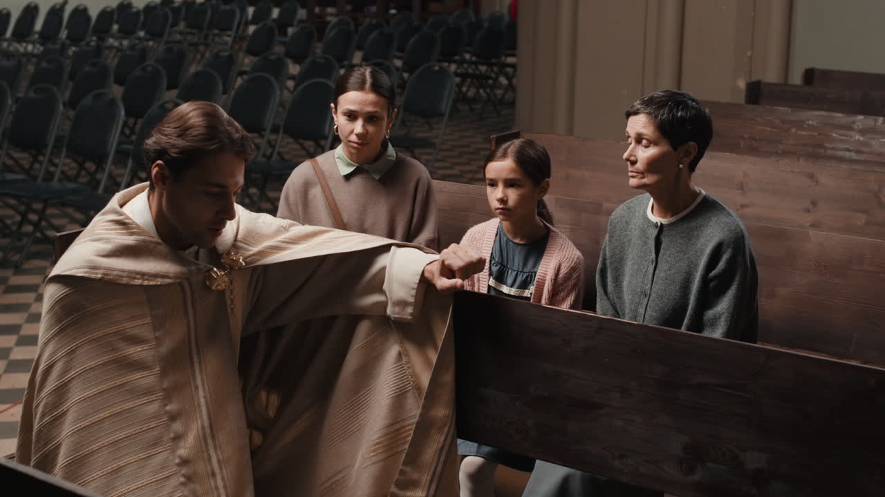 Family in church with priest