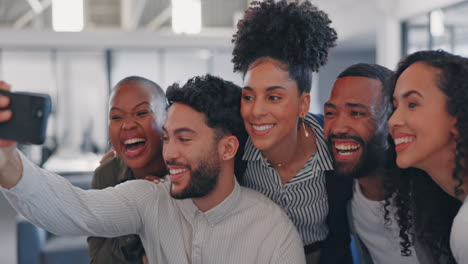 Team,-happy-or-business-people-take-a-selfie