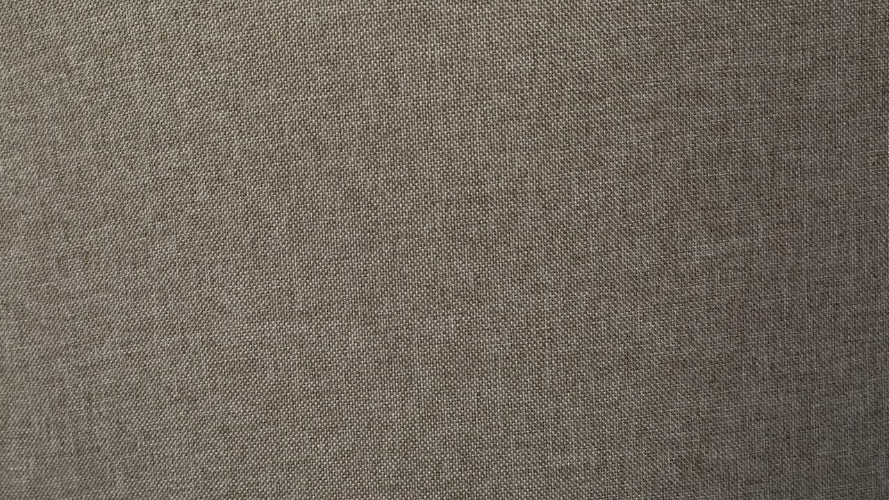 fotografía macro de cerca de la textura del tejido de lana gris claro de fondo 4k