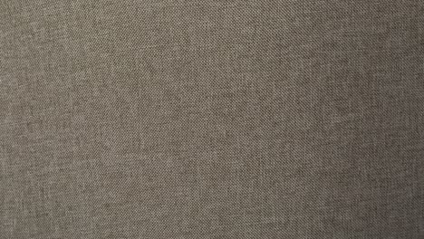 Close-Up-Macro-Shot-of-Light-Grey-Wool-Fabric-Texture-Background-4K