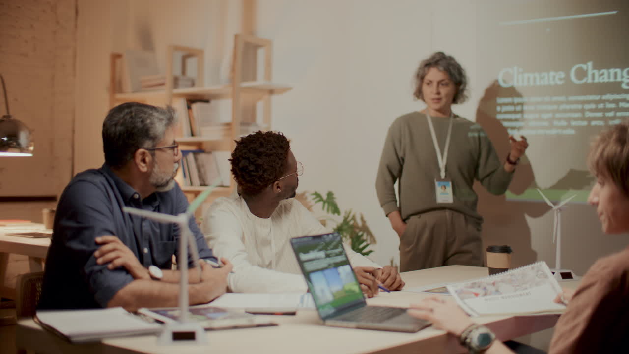 Woman Telling about Climate Change and Pollution during Office Presentation